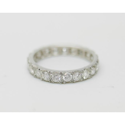 886 - A platinum and diamond eternity ring, 3g, L, (marked plat on side)