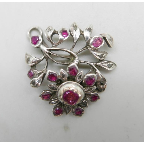 930 - An antique white metal, ruby and diamond pendant, 4.6g, 22mm wide