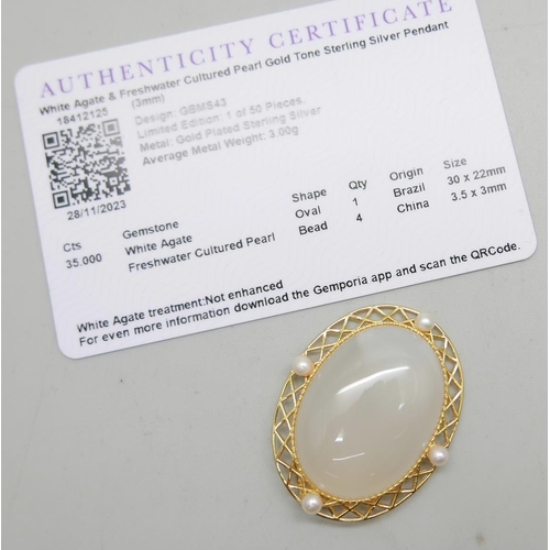 933 - A Gemporia silver gilt and agate pendant with certificate