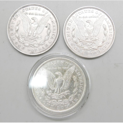 947 - Three silver US dollars, 1891, New Orleans mint, and two 1921