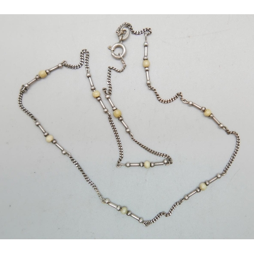 951 - A Malcolm Gray silver necklace, 39cm