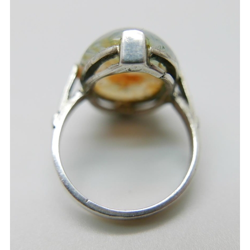 952 - A moss agate set silver ring, K/L, and earrings