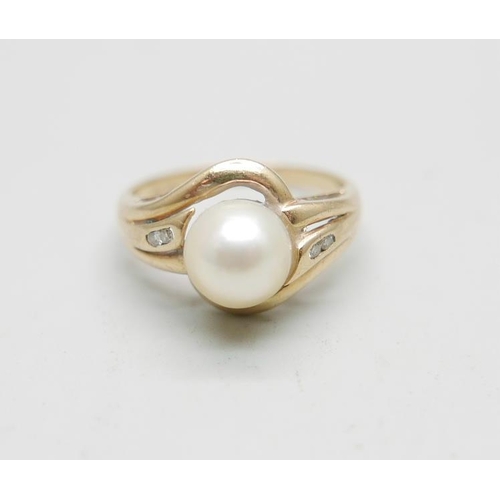 955 - A 14ct gold, pearl and diamond ring, 4.6g, R