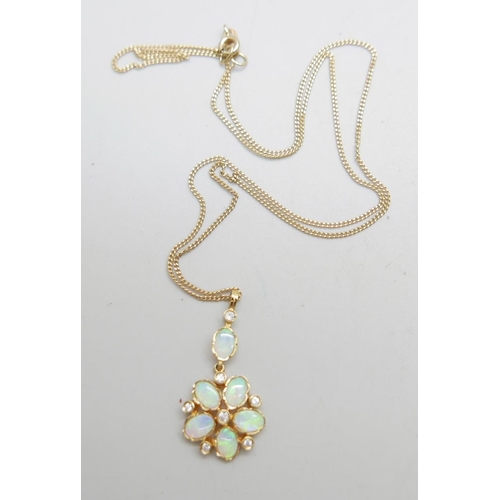 958 - A 9ct gold, opal and diamond pendant on a fine 9ct gold chain, 4.2g, chain 50cm