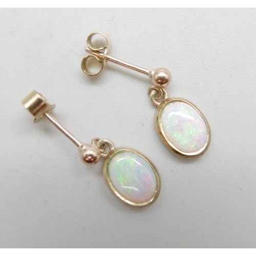 959 - A pair of 9ct gold and opal earrings