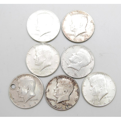 966 - Seven 900. silver 1964 Liberty Kennedy half-dollar coins, 86.9g, one drilled