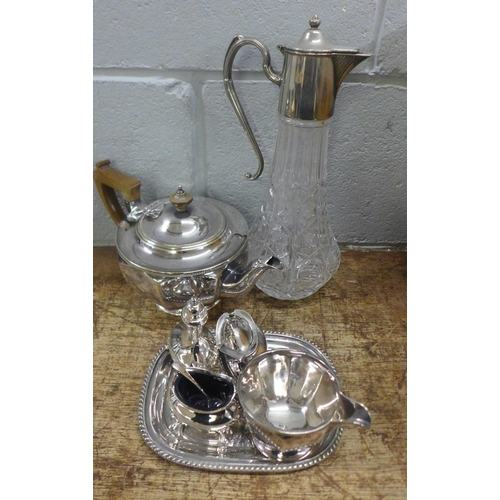 971 - A collection of plated ware, including a cruet set and a three piece tea service **PLEASE NOTE THIS ... 