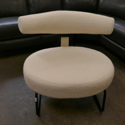 1447 - A Mila White boucle fabric and black frame lounge chair
