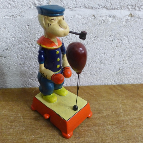 2055 - A Popeye boxing figure and a Kung Fu figure * this lot is subject to VAT