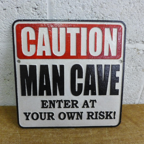 2062 - A Caution Man Cave sign * this lot is subject to VAT