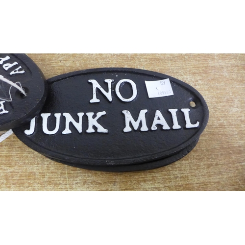2092 - Four oval cast iron signs * this lot is subject to VAT
