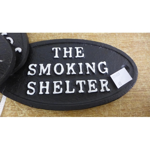 2092 - Four oval cast iron signs * this lot is subject to VAT