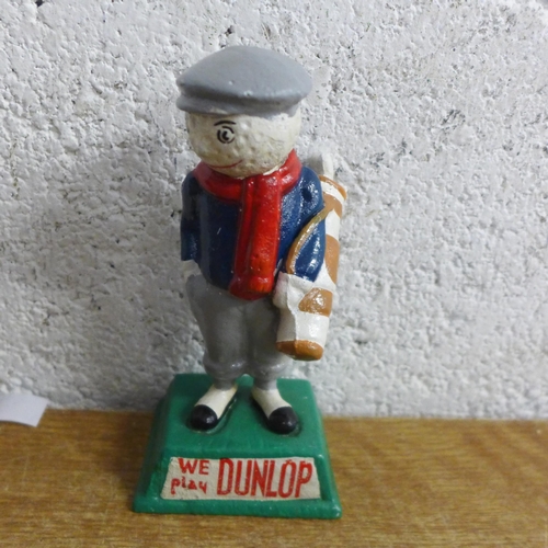 2108 - Two small golfer figures * this lot is subject to VAT