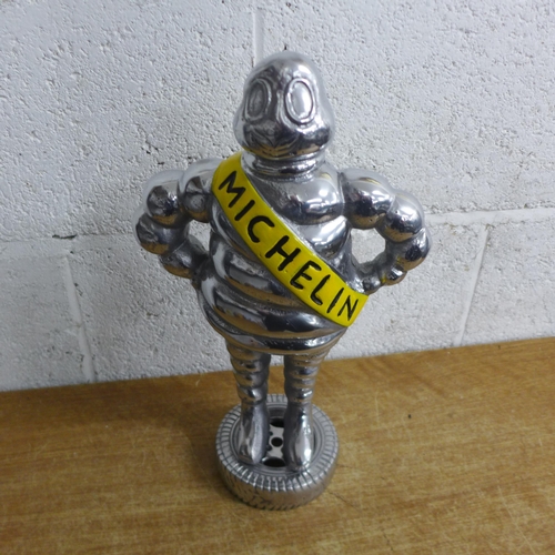 2112 - An aluminium Michelin figure * this lot is subject to VAT