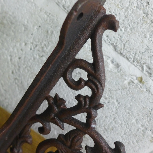 2118 - Four cast wall brackets - rust * this lot is subject to VAT