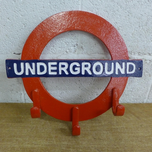2126 - A London underground sign coat rack * this lot is subject to VAT