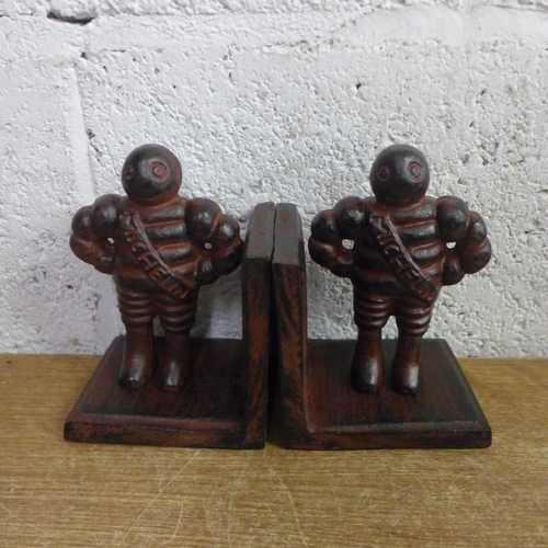 2128 - A pair of Brown Michelin men bookends * this lot is subject to VAT