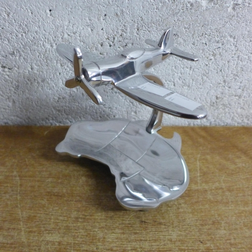 2141C - A polished aluminium plane and map * this lot is subject to VAT