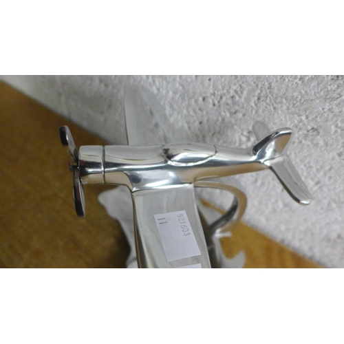 2141C - A polished aluminium plane and map * this lot is subject to VAT