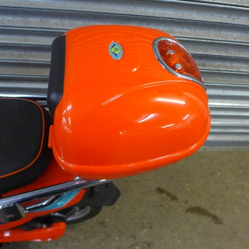 2212 - An E-Moto 'All Seasons' electric moped scooter with battery charger, 2 keys, cover and spare tire