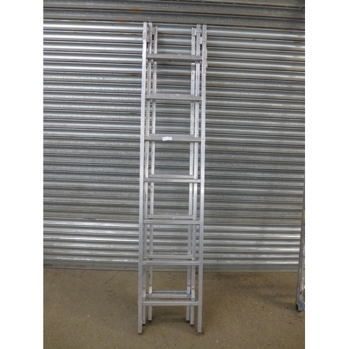 2218 - A tripple 7 rung extending alliminium ladder and a single 9 rung ladder