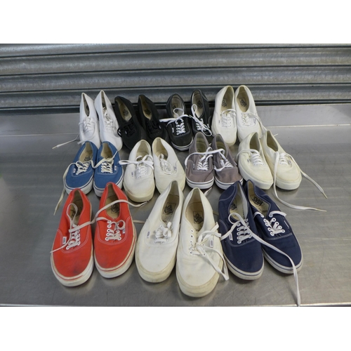 2325 - A box of assorted worn trainers mostly Vans in assorted colours, styles and sizes