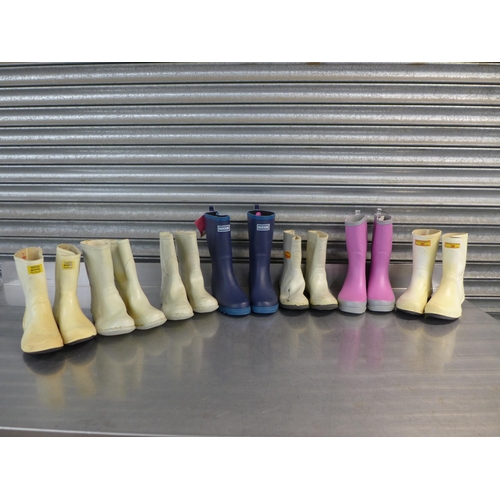 2334 - Six pairs of Wellington boots; three pairs of Antistatic white and yellow size 6, recatta high top b... 