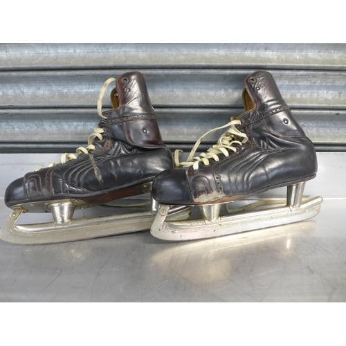 2339 - A pair of Kovopol Vintage ice skates and a pair of Apollo inline skates UK size 9