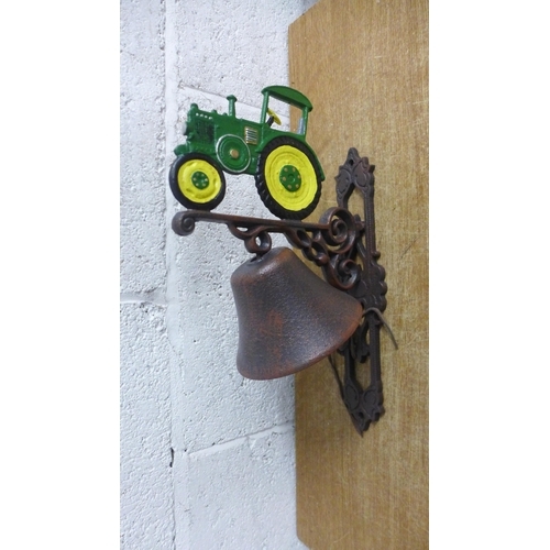 2115 - A green tractor bell * this lot is subject to VAT