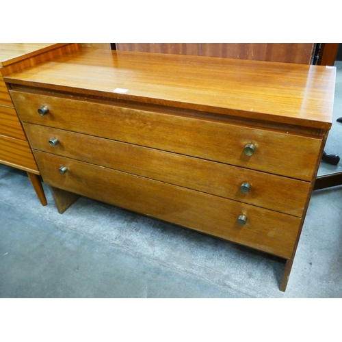 56 - A teak chest of drawers