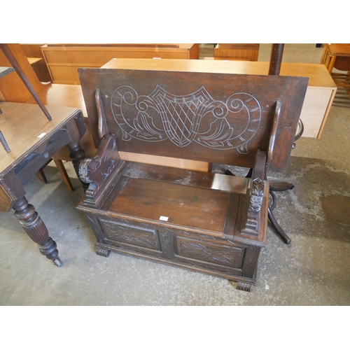 136 - A 17th Century style carved oak monk's bench