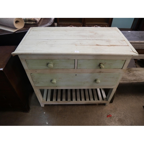 190 - An early 20th Century painted pine four drawer pantry table