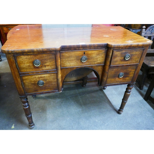 92 - A George IV mahogany inverted breakfront sideboard