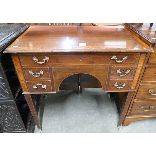 121 - A George III inlaid mahogany five drawer writing table
