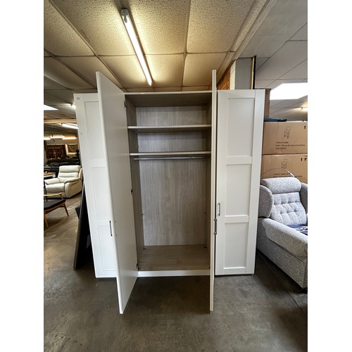 1480 - A white four door wardrobe * this lot is subject to VAT