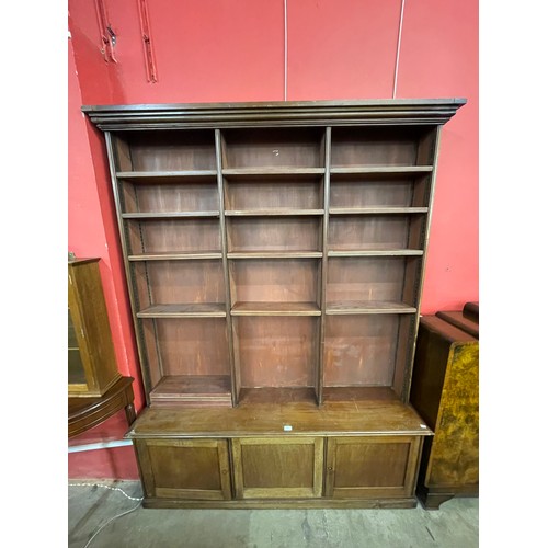 84 - An Edward VII mahogany open bookcase