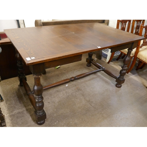 106 - An oak dining table