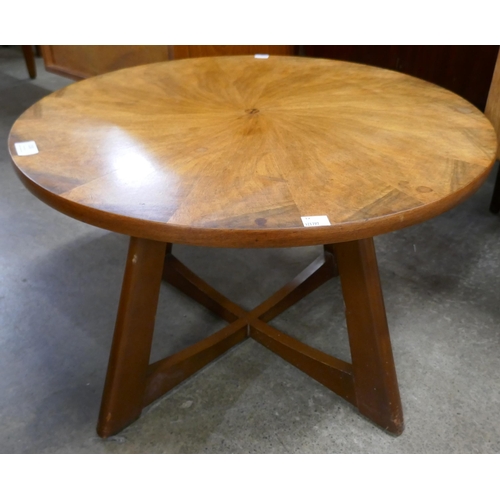 110 - A teak and walnut circular coffee table
