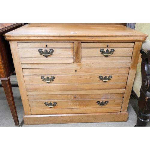 122 - A George III style beech chest of drawers