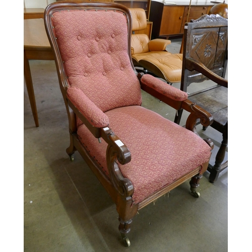 138A - A gentleman's Victorian carved mahogany reclining armchair