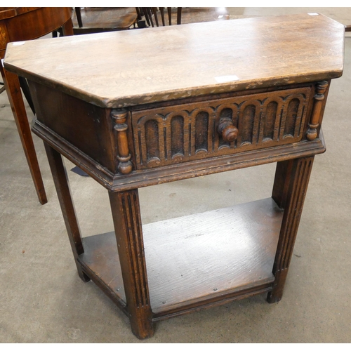 144 - An oak hall table