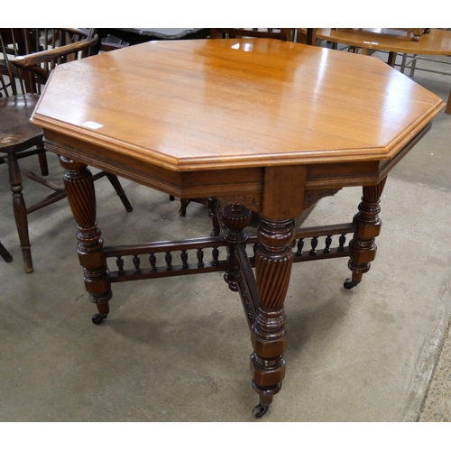 147 - An Edward VII walnut octagonal centre table