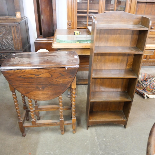 155 - An oak barleytwist gateleg table and an oak open bookcase