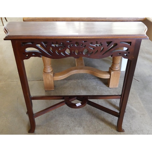 177 - A carved mahogany hall table