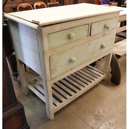 190 - An early 20th Century painted pine four drawer pantry table