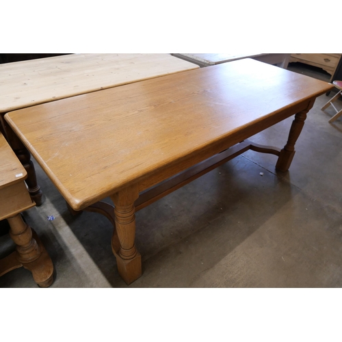 196 - A French oak refectory table