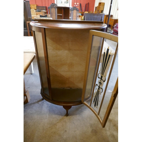 207 - A mahogany bow front display cabinet