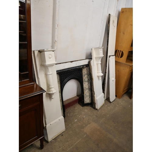 210 - A Victorian slate fire surround with cast iron tiled insert