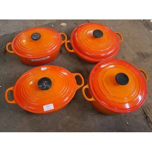 212 - Four Le Creuset volcanic orange cooking pots