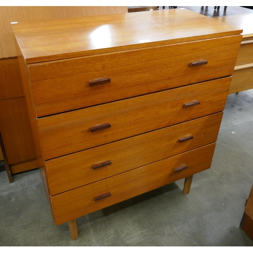 26 - A teak chest of drawers
